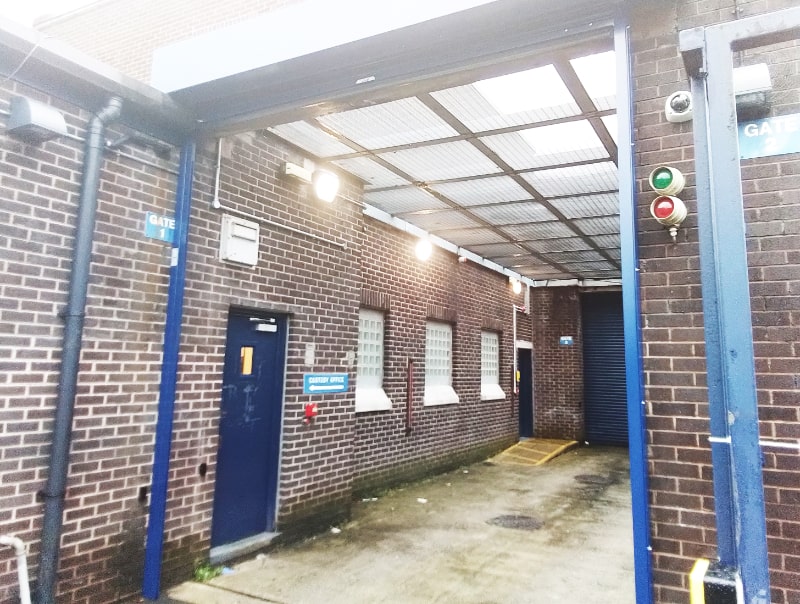 Image of open roller shutter door in Huyton Police Station, Liverpool