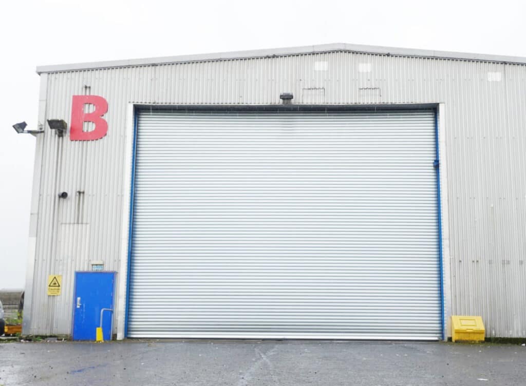 Roller shutter door installation by BGS Glasgow (Bellshill); exterior image 1/2 (21-8-2024)